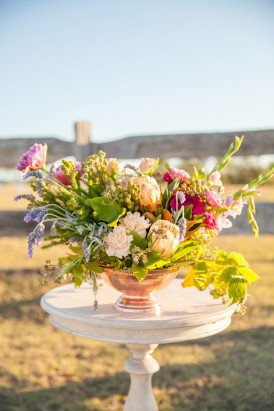 Flower arrangement in copper vase