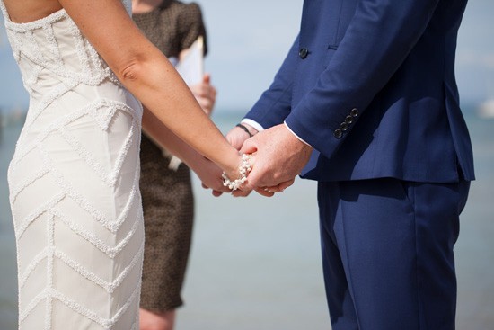 Holding hands at wedding