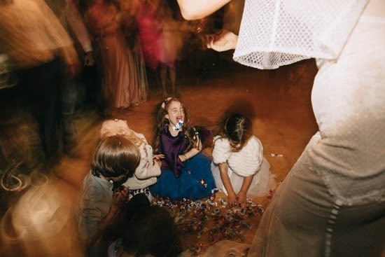 Kids with pinata at wedding