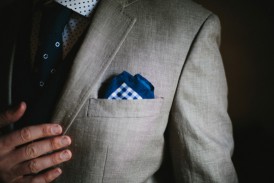 Pale gray suit with blue pocketsquare