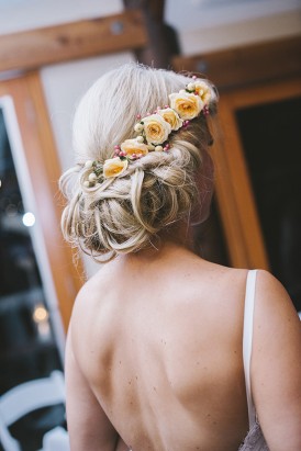 Peach roses in wedding hair style