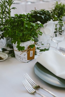 Potted herb place settings at wedding