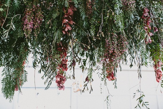 Wedding decor of hanging pepperberry branches