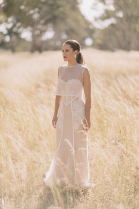 Wedding gown with mesh overlay