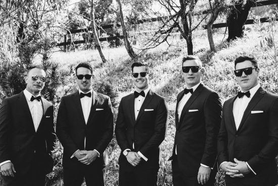groomsmen in black bowties