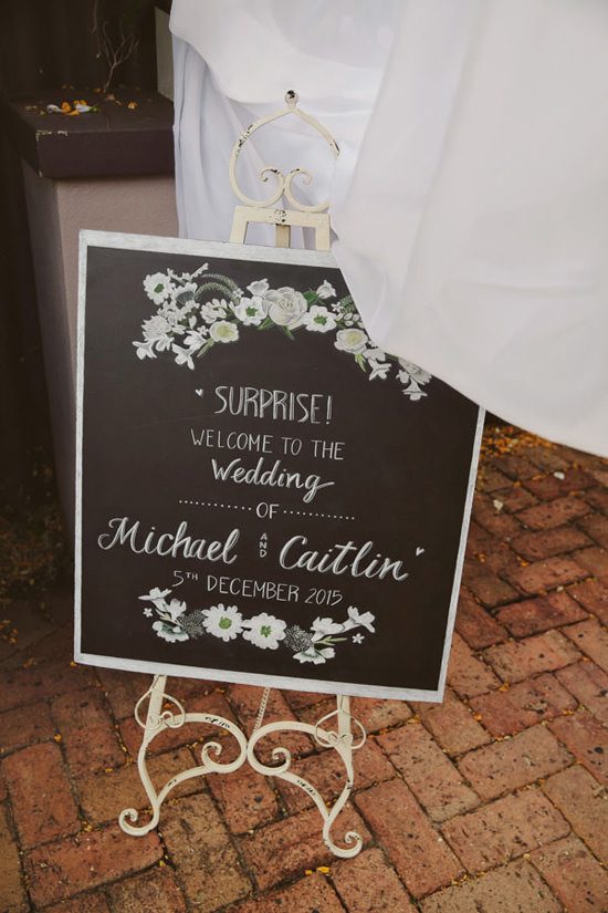 Wedding sign with pretty chalk flowers