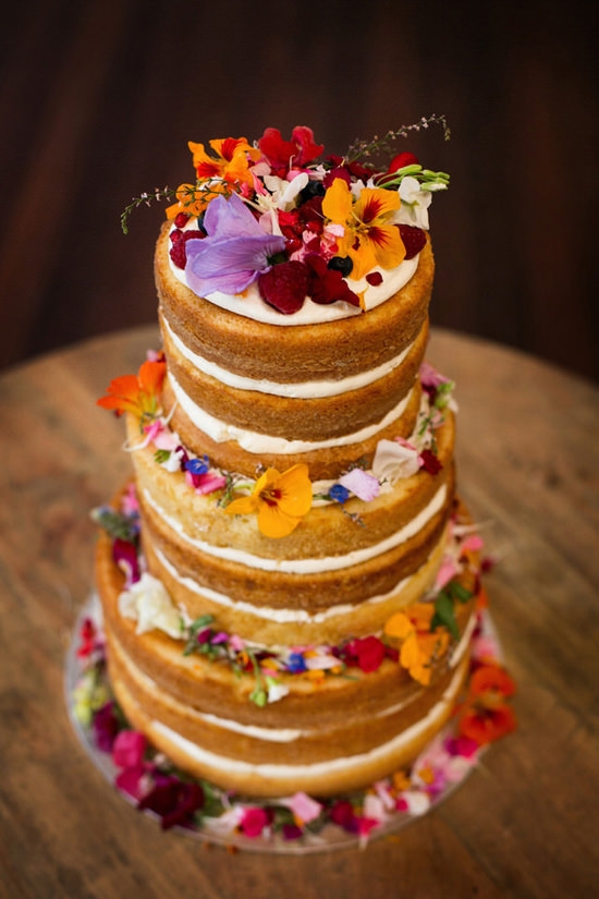 naked-wedding-cake-with-bright-flowers